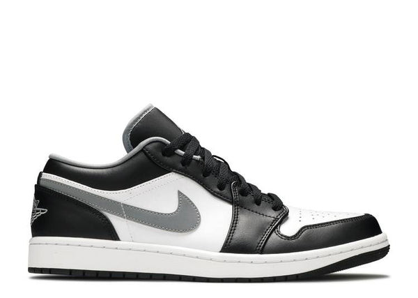 Side view of Air Jordan 1 Low in black, white, and grey